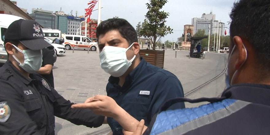 Taksim'de polisten İran'lı vatandaşa tepki: Benim vatandaşım evde oturuyorsa sen de oturacaksın!