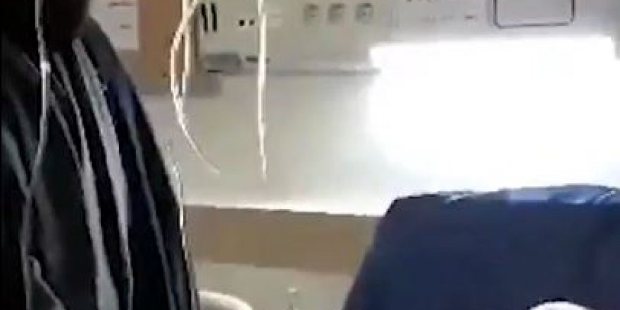 İranlı molla korona virüslü hastanın dudaklarına 'şifa' sürdü!