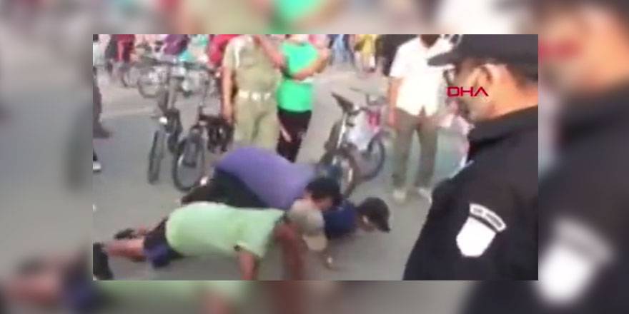 Polisten maske takmayanlara "şınav çekme" cezası