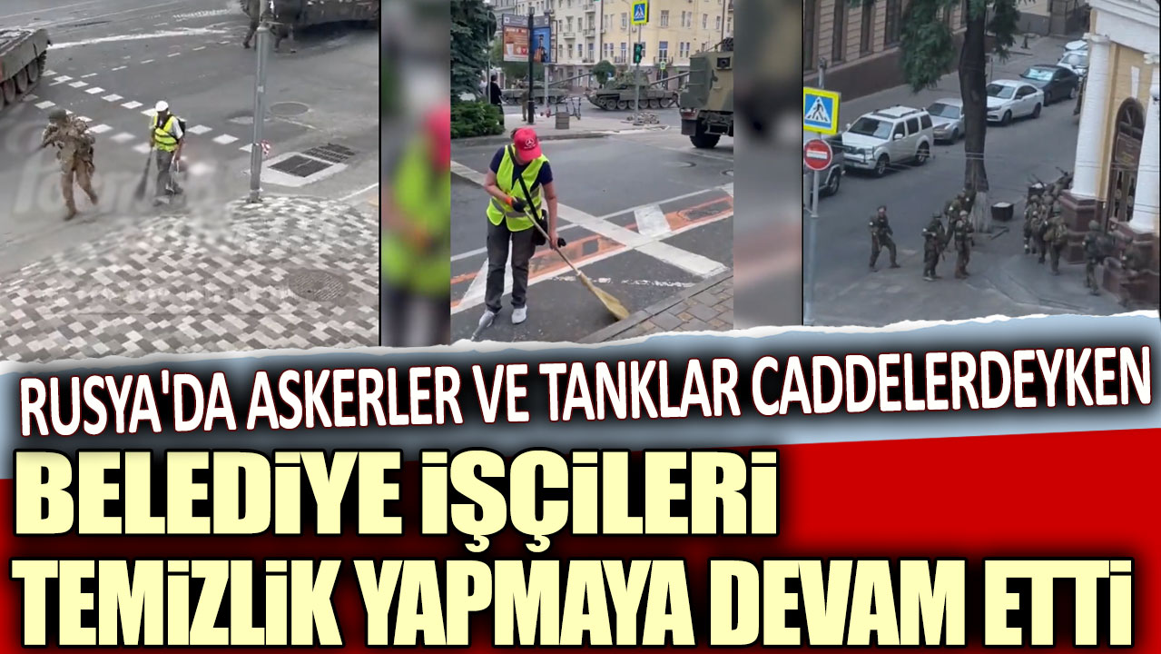 Rusya'da askerler ve tanklar caddelerdeyken belediye işçileri temizlik yapmaya devam etti