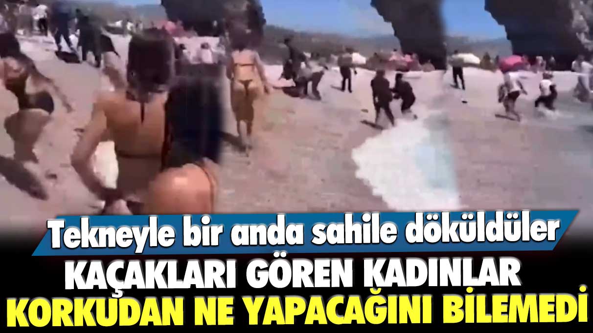 Tekneyle bir anda sahile döküldüler! Kaçakları gören kadınlar korkudan ne yapacaklarını bilemedi