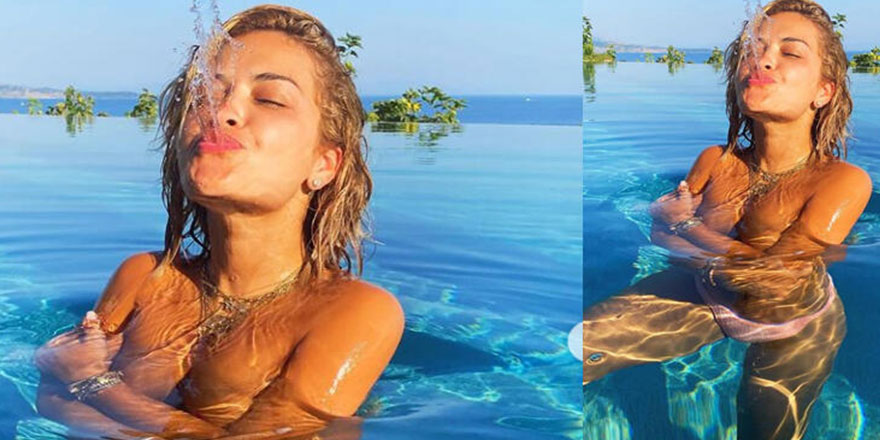 Rita Ora tatil yapmaya doyamadı: Havuzda üstsüz poz