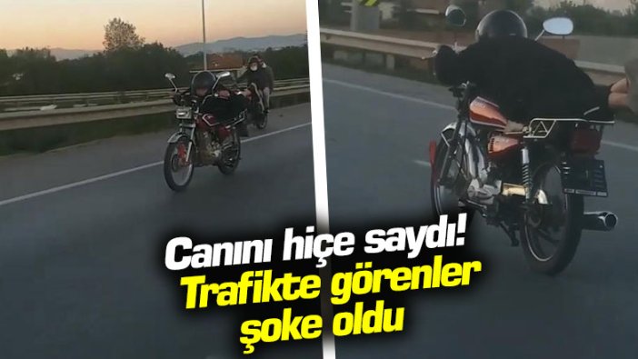 Canını hiçe saydı! Motosikleti yatarak kullandı