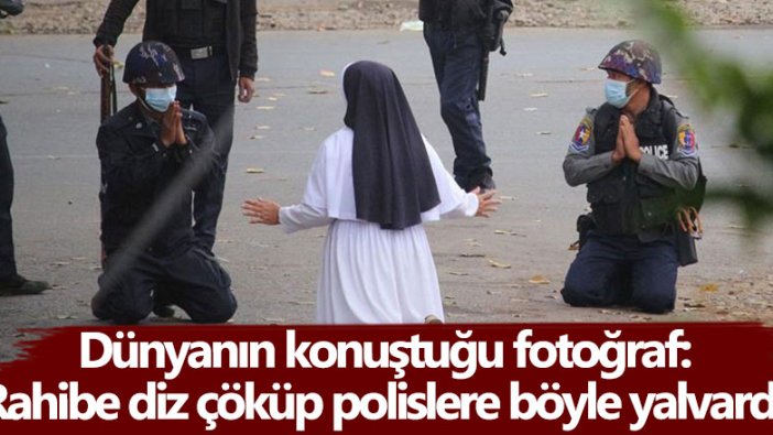 Dünyanın konuştuğu fotoğraf: Rahibe diz çöküp polislere böyle yalvardı!