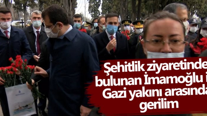 Şehitlik ziyaretinde bulunan Ekrem İmamoğlu ile Gazi yakını arasında gerilim
