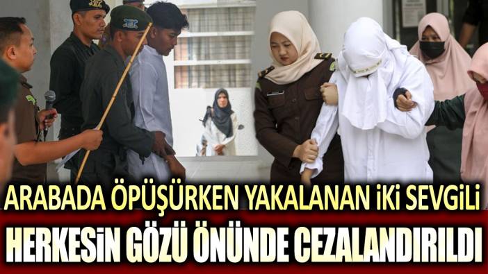 Arabada öpüşürken yakalanan çift, onlarca kişi içinde kırbaçlanarak cezalandırıldı