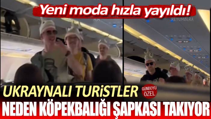 Yeni moda hızla yayıldı! Ukraynalı turistler neden köpekbalığı şapkası takıyor