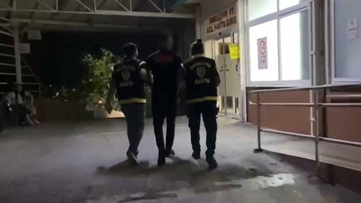 Marmaris'te ağacın üzerinde meşaleyle şov yapan bar çalışanı gözaltına alındı