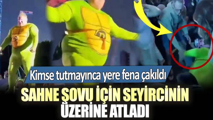 Sahne şovu için seyircinin üzerine atladı: Kimse tutmayınca yere fena çakıldı