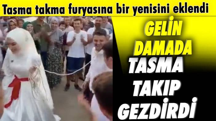 Gelin damada tasma takıp gezdirdi