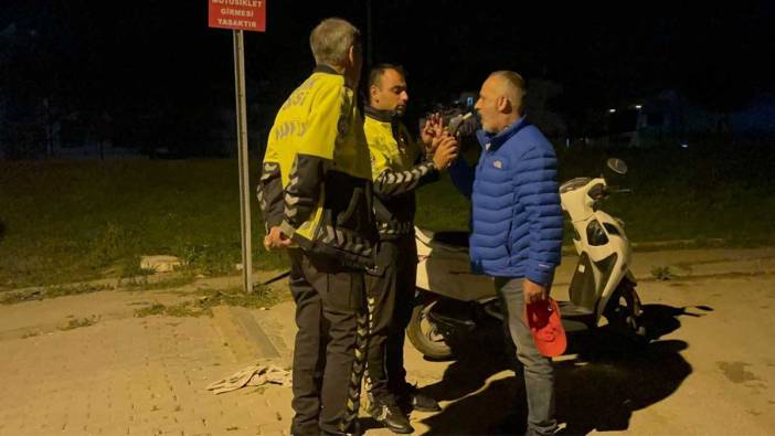 Devrilen motosikletten düşen alkollü sürücü ortalığı birbirine kattı