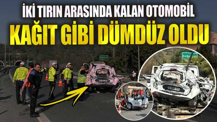 İzmir’de iki tırın arasında kalan otomobil kağıt gibi dümdüz oldu