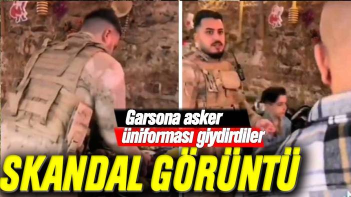 Restoranda garsona asker üniforması giydirip servis yaptırdılar