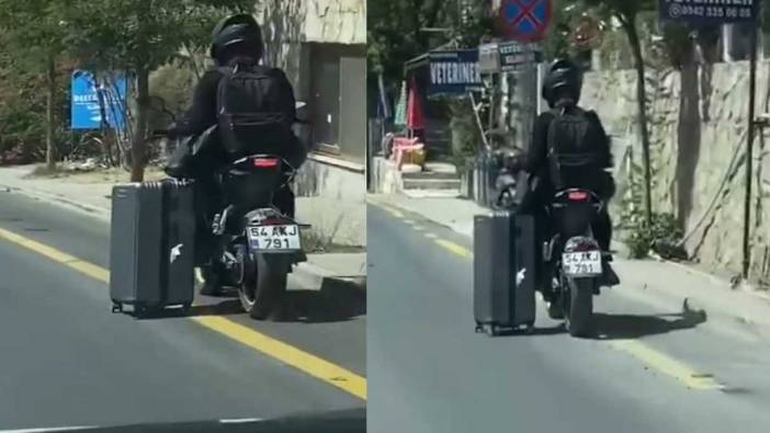 Trafikte pes dedirten manzara! Valiz taşıyarak motor sürdü